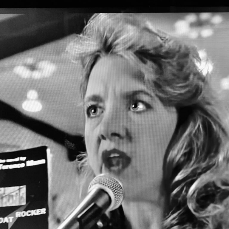 Actress Lee Garlington portraying book banner